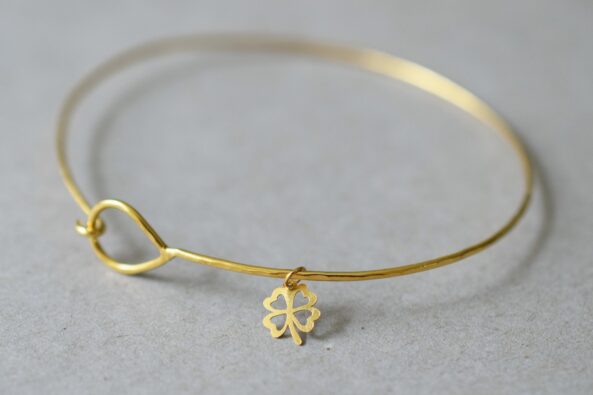 Fine Hammered Bangle with tiny Clover