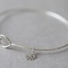 Fine Hammered Bangle with tiny Snowflake