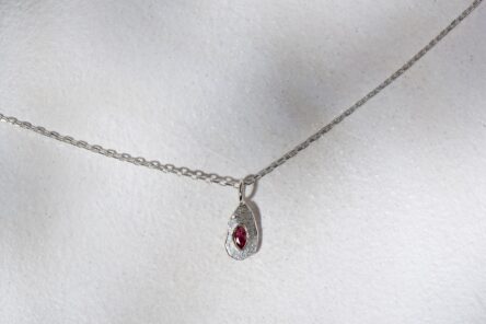 Necklace Capsule With Red Sapphire